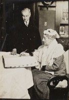 Image of Abigail Scott Duniway registering as first woman voter in Portland, February 14, 1913.